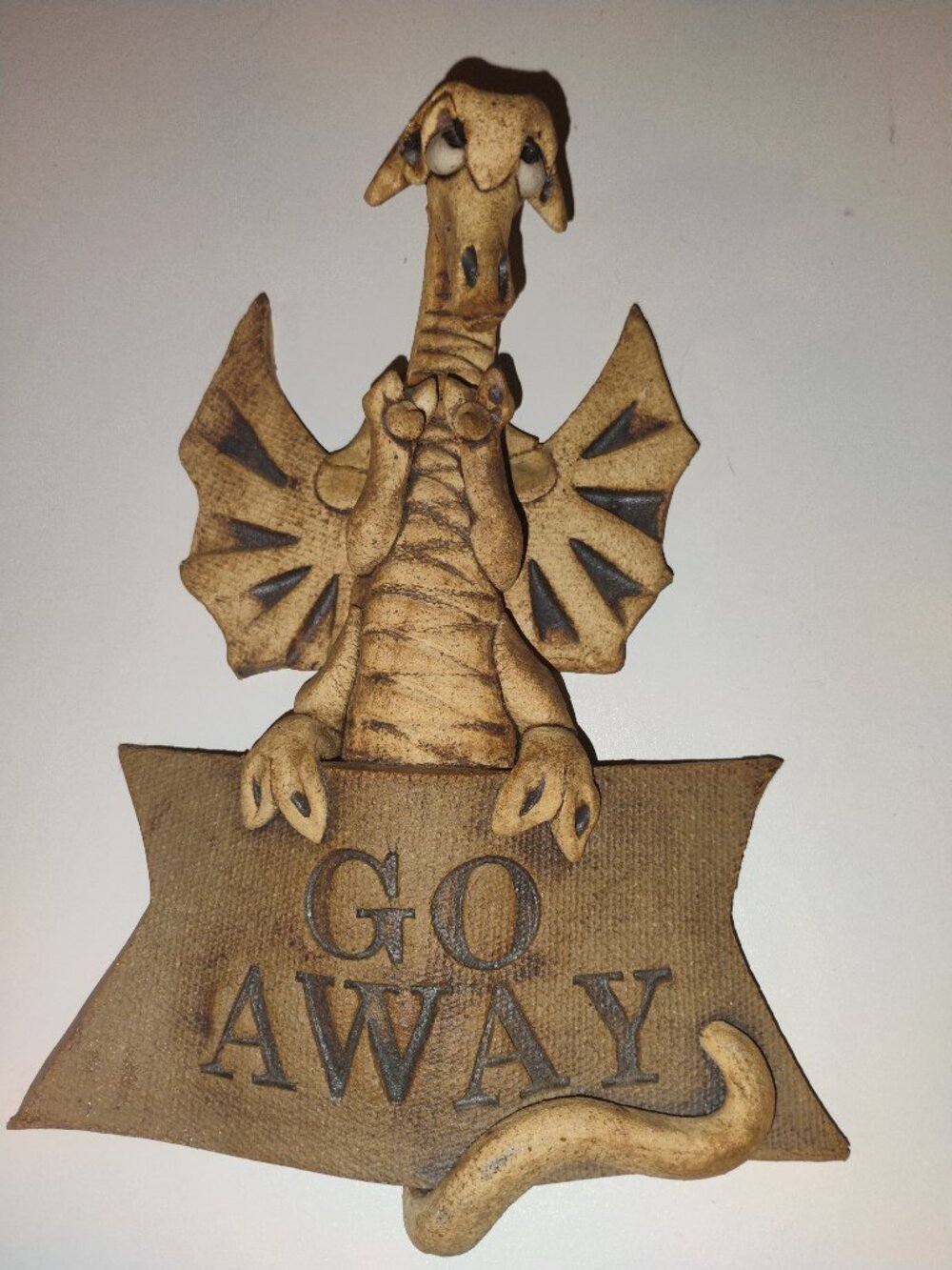 Go away door sign